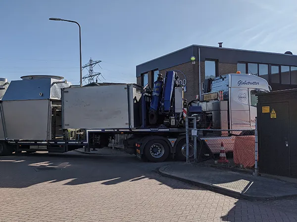 Installation loaded on a truck, ready for transport to site